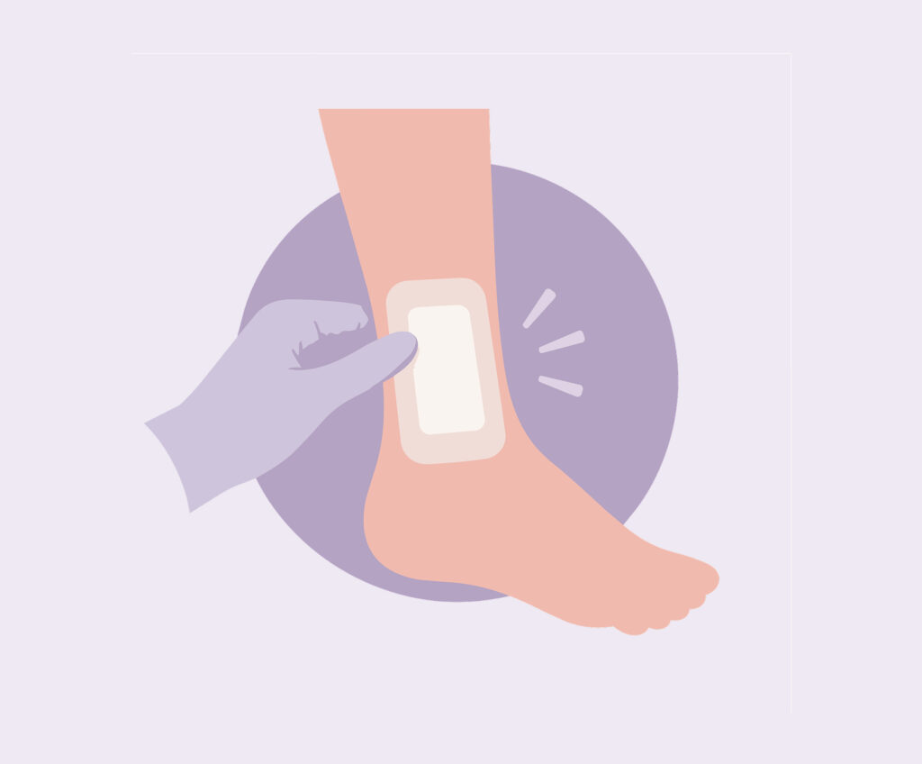 icon of a doctor applying a bandage to a foot with a wound